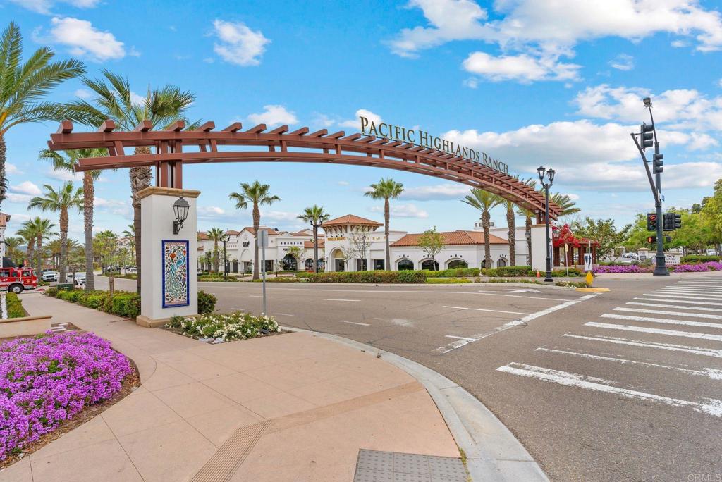 13018 Lumen Way San Diego, CA 92130 - Photo 40 of 45 a view of a street with a building in the background