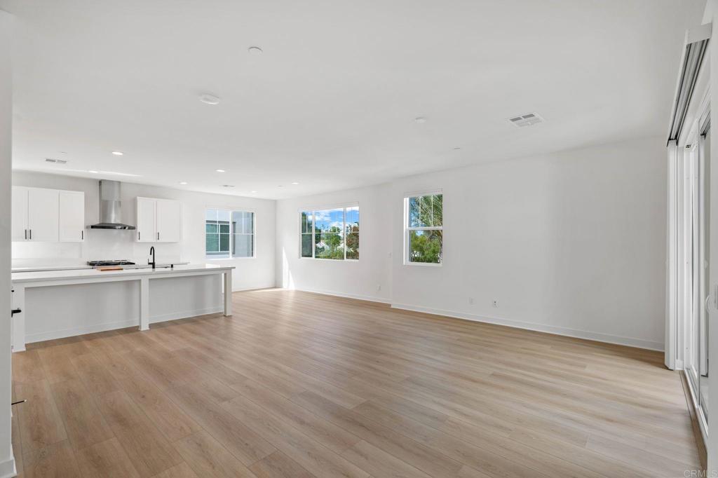 13018 Lumen Way San Diego, CA 92130 - Photo 10 of 45 a view of kitchen with wooden floor