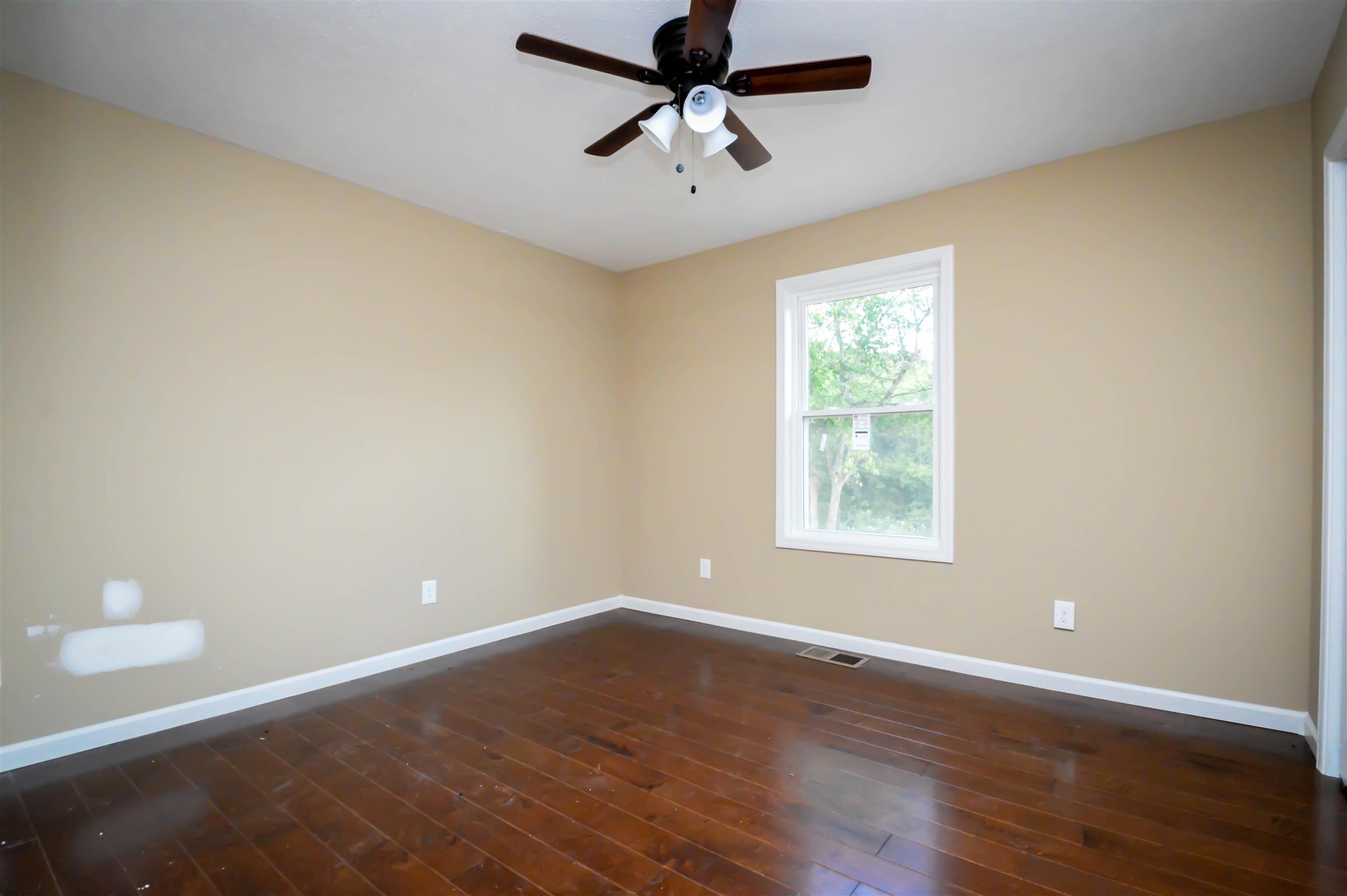 30 Riddleton Circle Pleasant Shade, TN 37145 - Photo 16 of 18 a view of a livingroom with a window and wooden floor