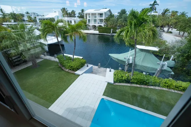 a view of a garden from a balcony