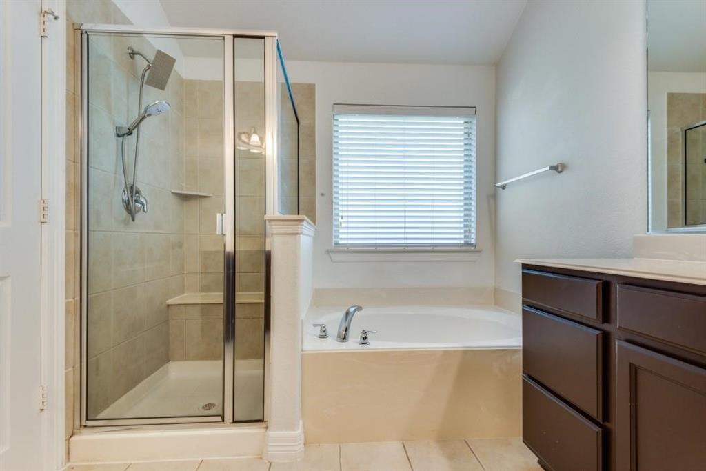 1513 Rosson Road Little Elm, TX 75068 - Photo 13 of 17 a bathroom with a bathtub and a shower