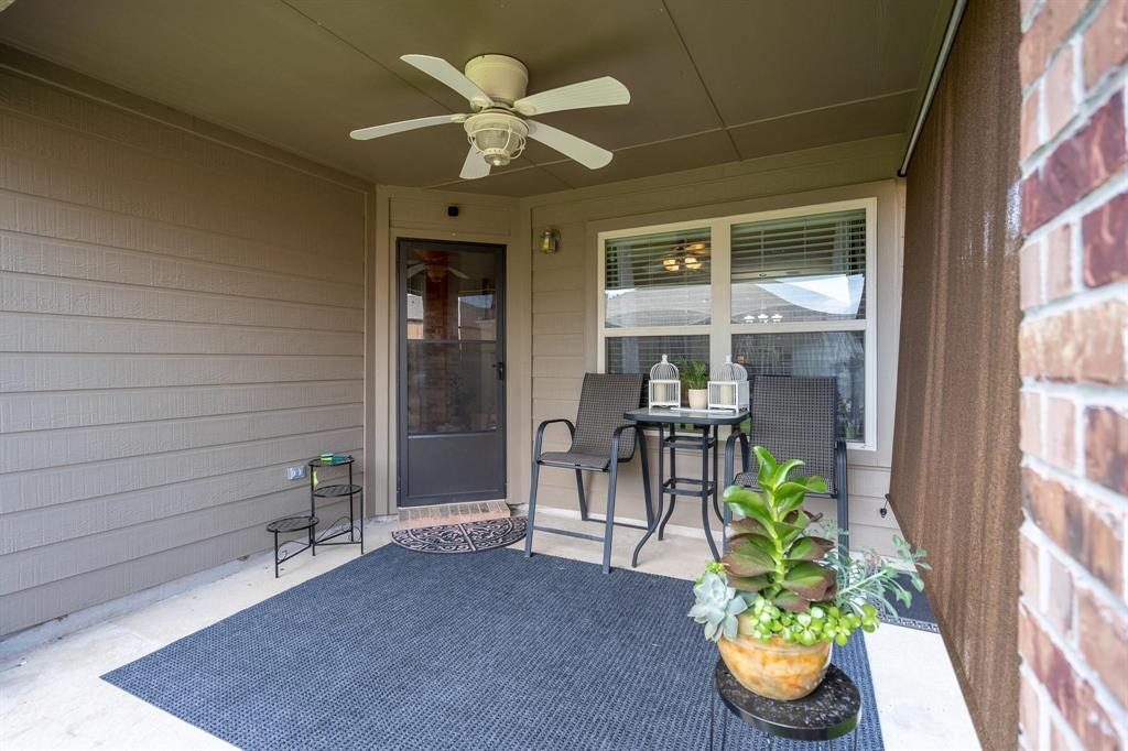 1513 Rosson Road Little Elm, TX 75068 - Photo 16 of 17 a dining room filled with furniture and a potted plant