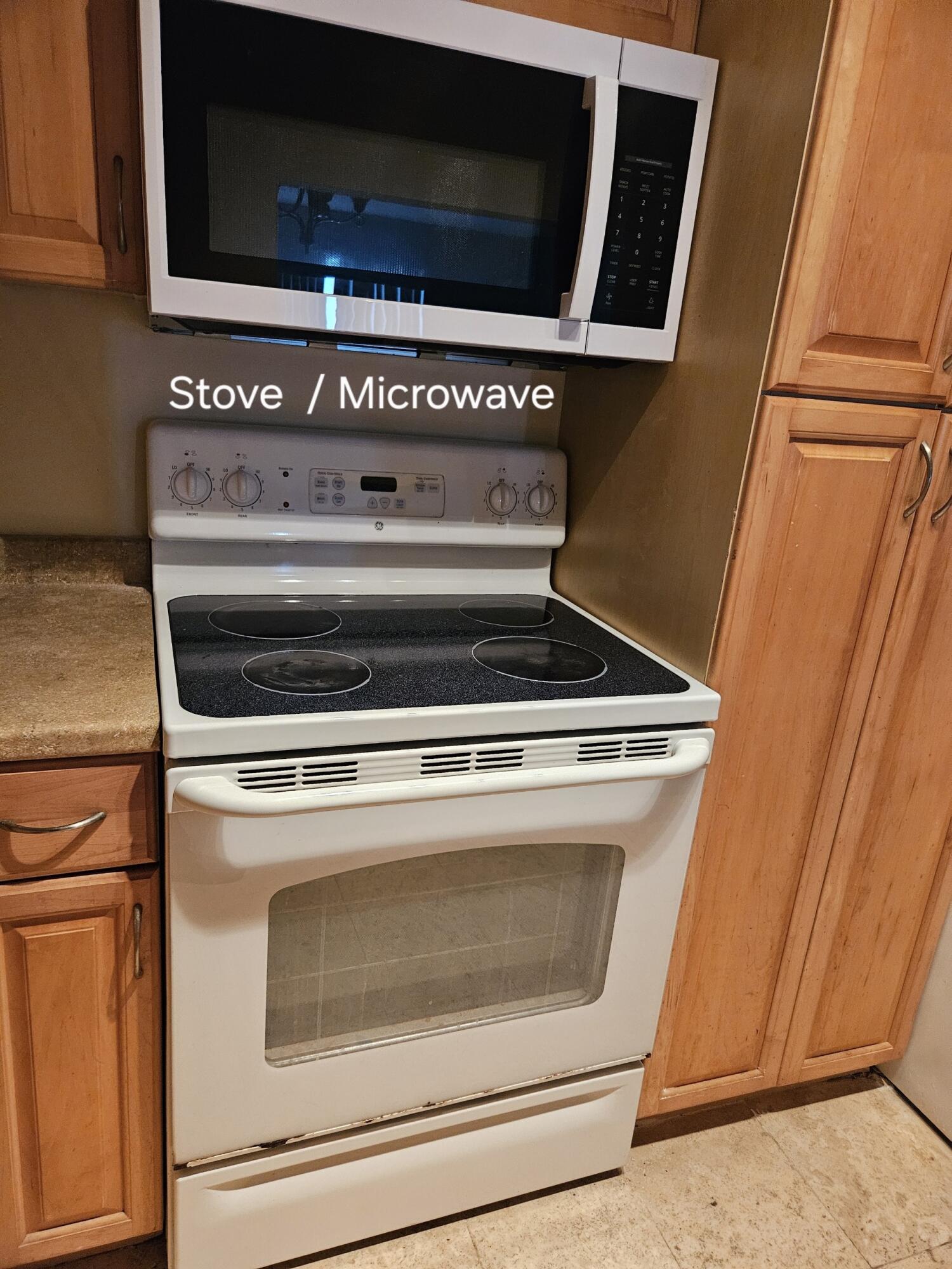 4164 Inverrary Drive, Unit 806 Lauderhill, FL 33319 - Photo 11 of 23 a stove top oven sitting inside of a kitchen