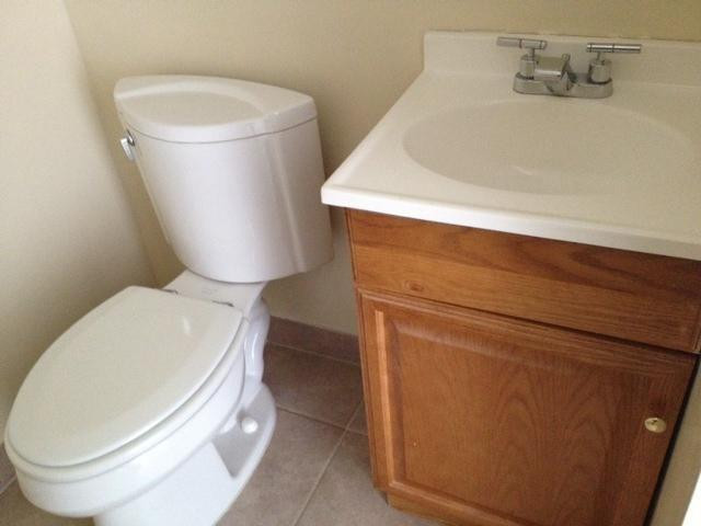 4164 Inverrary Drive, Unit 806 Lauderhill, FL 33319 - Photo 15 of 23 a bathroom with a toilet and a sink