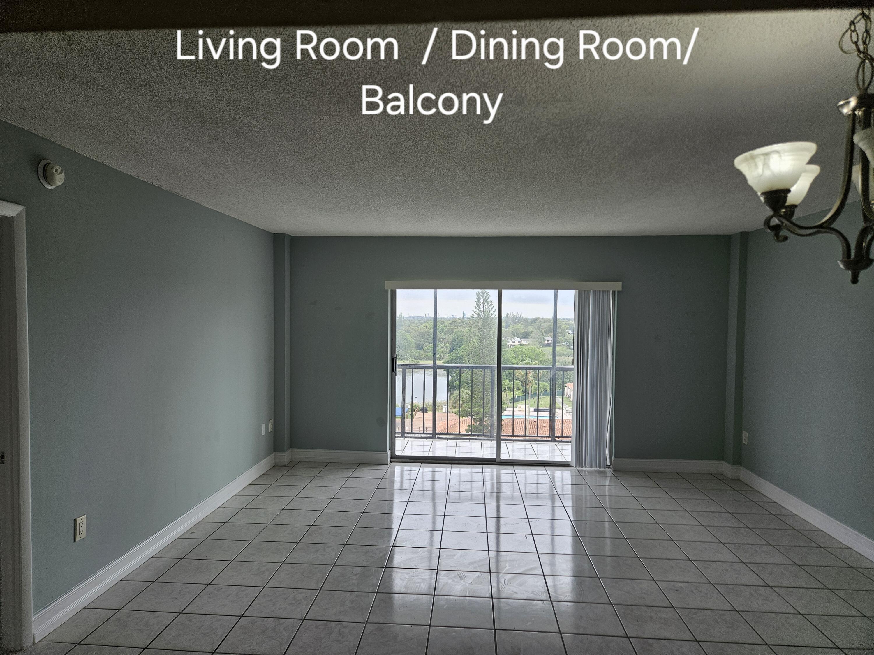 4164 Inverrary Drive, Unit 806 Lauderhill, FL 33319 - Photo 19 of 23 a view of an empty room and window