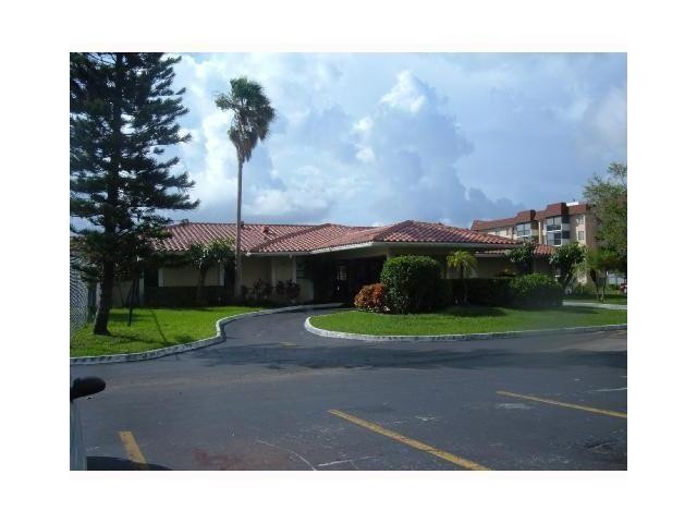 4164 Inverrary Drive, Unit 806 Lauderhill, FL 33319 - Photo 6 of 23 a view of street with a small yard