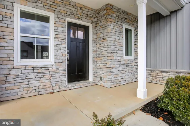 a house view with a garden space