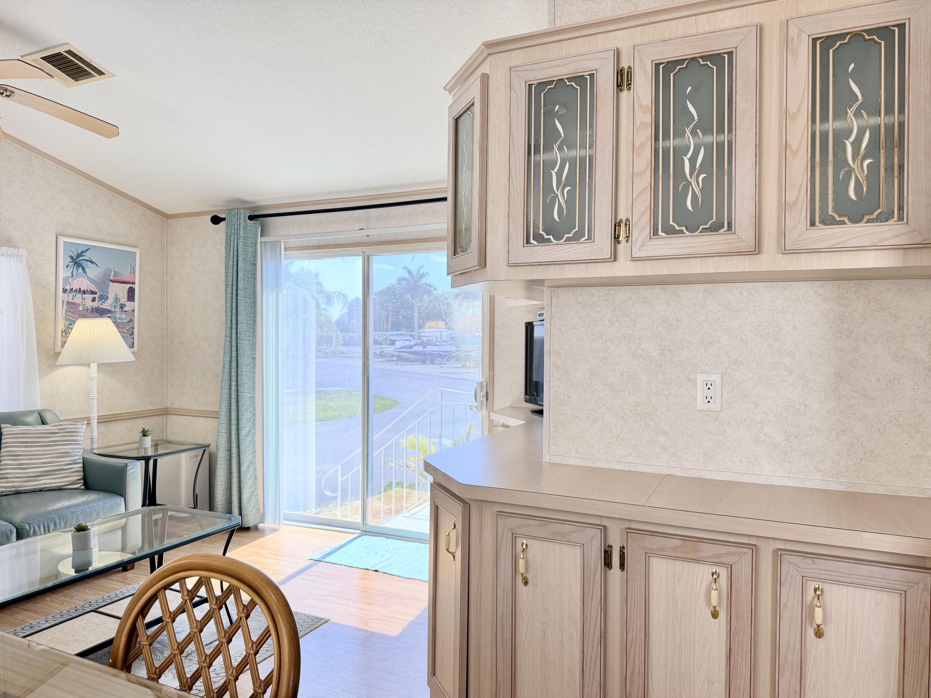 2 Jade Drive Naples, FL 34114 - Photo 15 of 44 a view of a livingroom with furniture and window