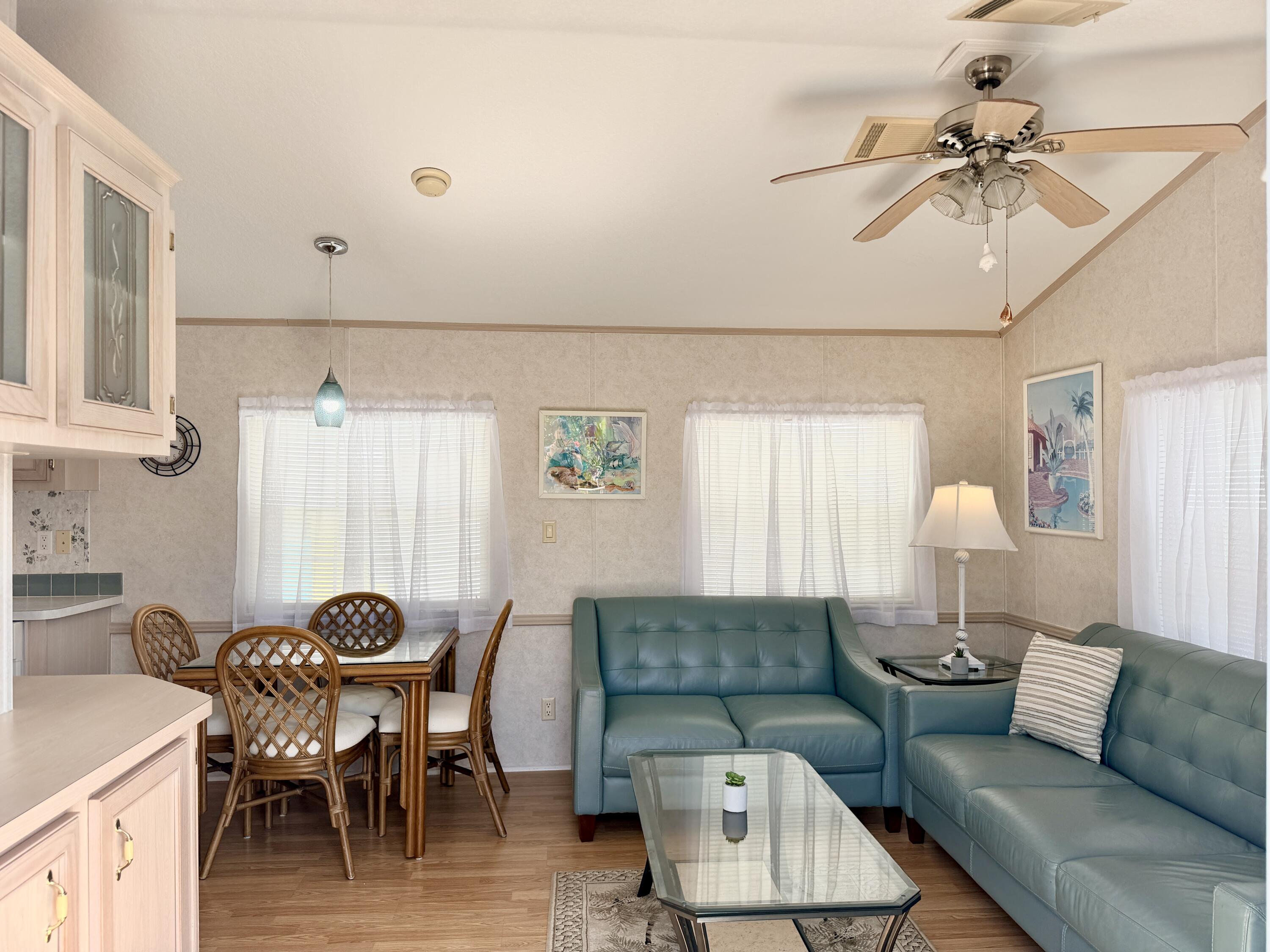2 Jade Drive Naples, FL 34114 - Photo 18 of 44 a living room with furniture and a window