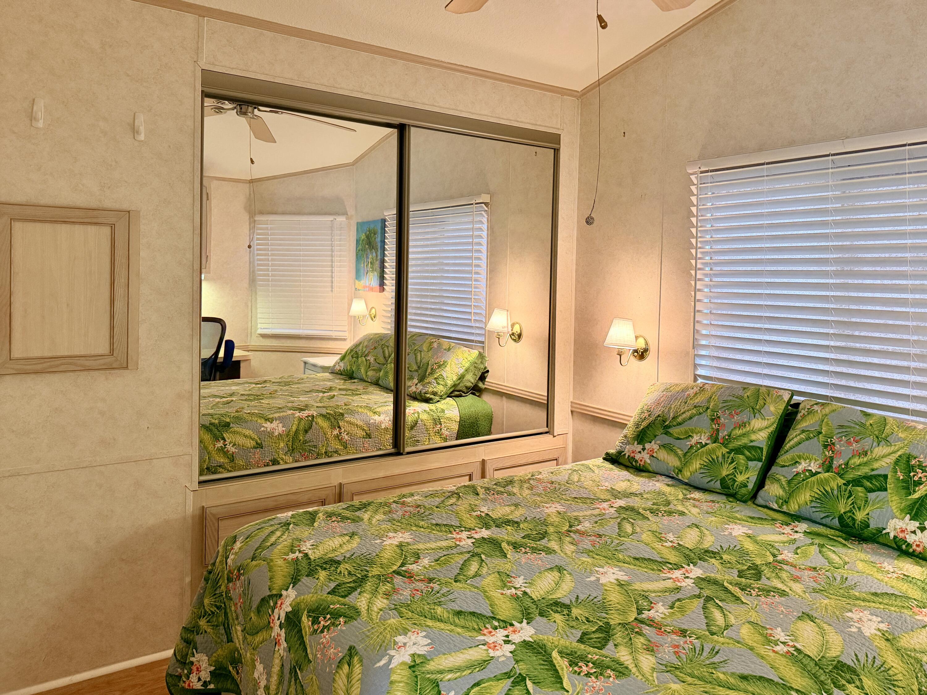 2 Jade Drive Naples, FL 34114 - Photo 24 of 44 a bedroom with a bed and window