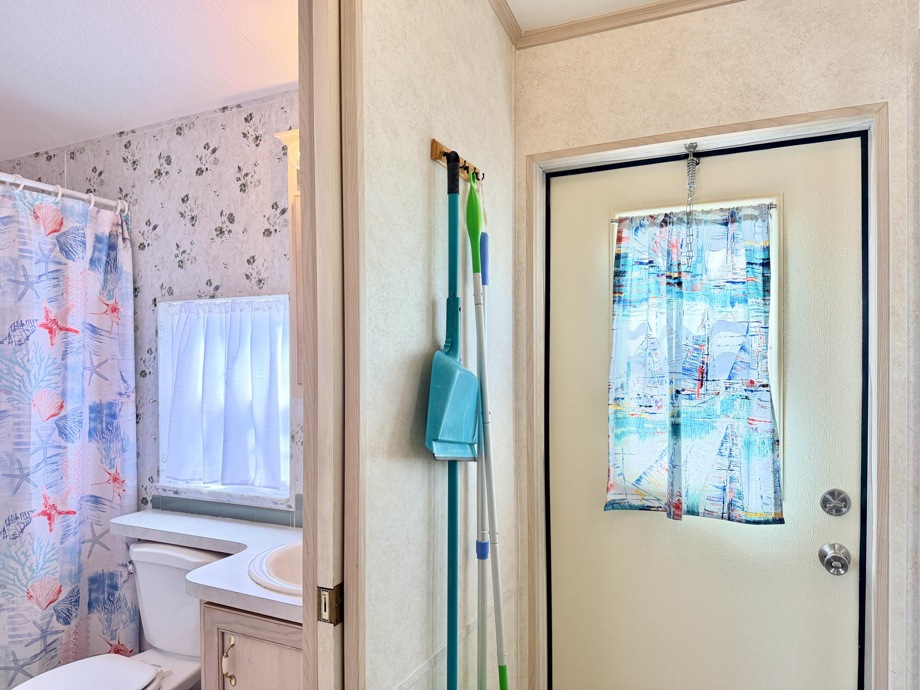 2 Jade Drive Naples, FL 34114 - Photo 4 of 44 a bathroom with a shower and a toilet