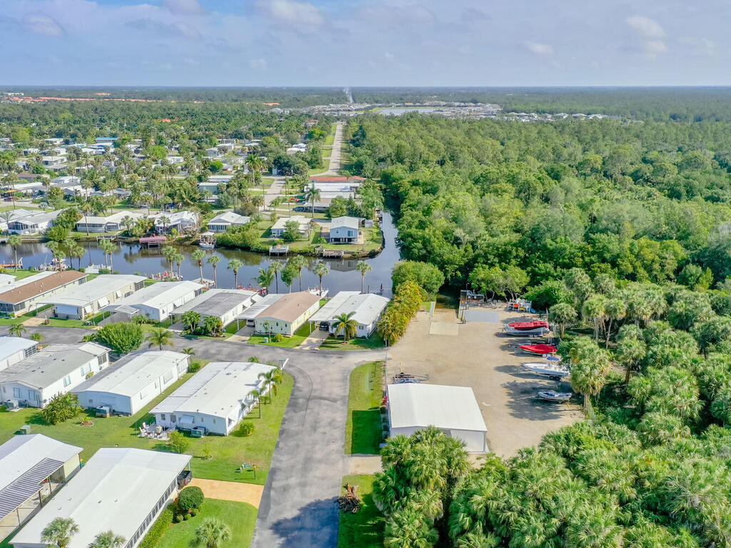 2 Jade Drive Naples, FL 34114 - Photo 43 of 44 an aerial view of residential houses with outdoor space and trees