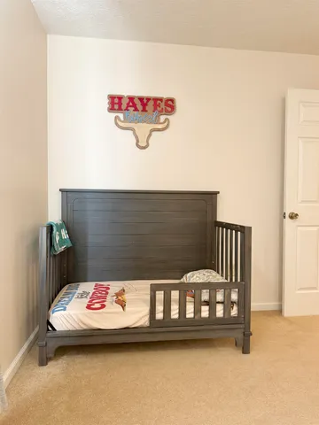 a view of a street with cars