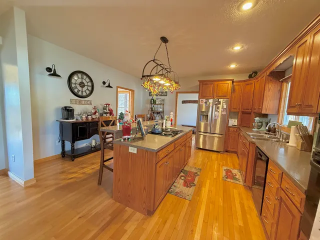 a very nice looking dining room with a large window