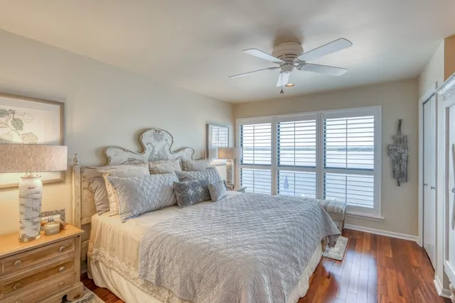 a bedroom with a bed and a table