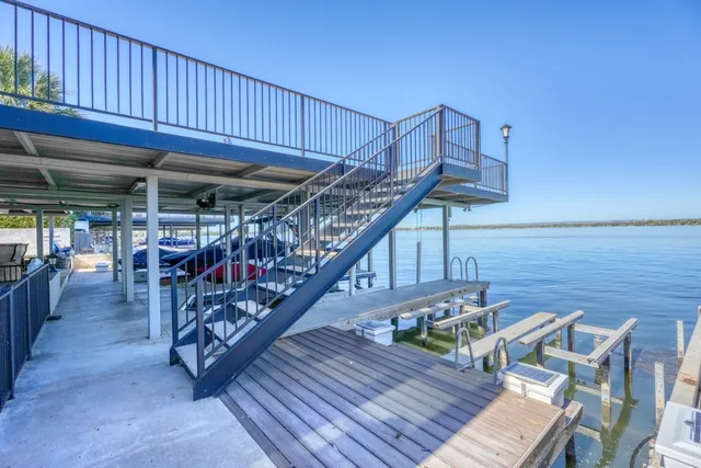 a view of a house with a patio and wooden floor