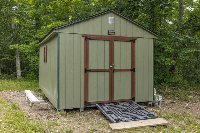 a room with furniture and wooden floor