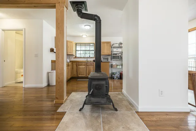 a bathroom with a sink a mirror and a shower