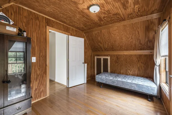 a view of a lake with a yard