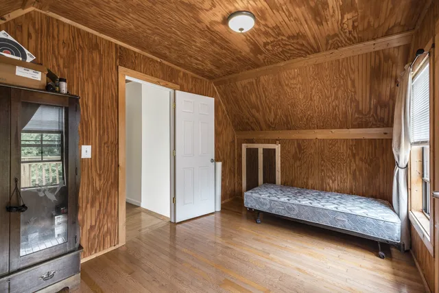 a view of a lake with a yard