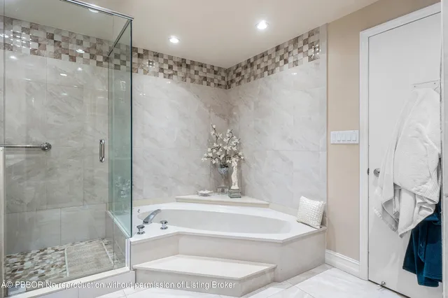 a bed room with a bed and a couch