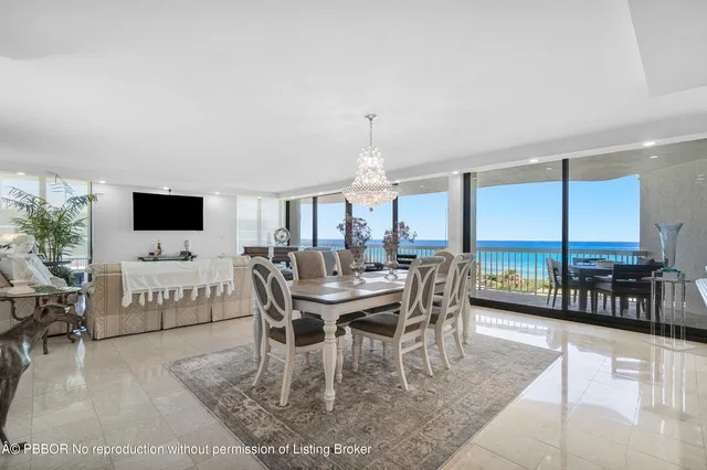 a view of swimming pool with furniture