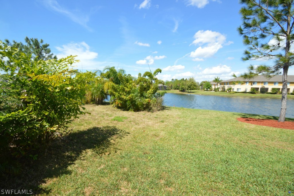 11706 Tempest Harbor Loop Venice, FL 34292 - Photo 16 of 20 a view of a lake with a city