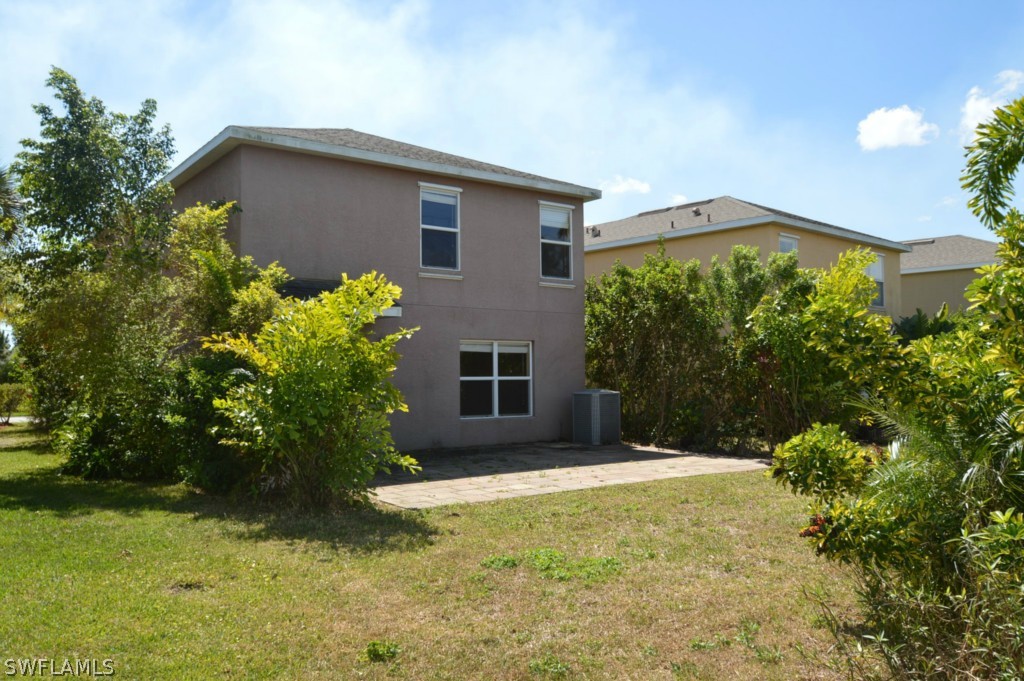 11706 Tempest Harbor Loop Venice, FL 34292 - Photo 2 of 20 a front view of a house with a yard