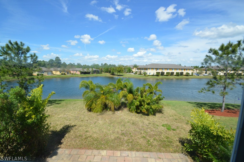 11706 Tempest Harbor Loop Venice, FL 34292 - Photo 4 of 20 a view of a lake with a city