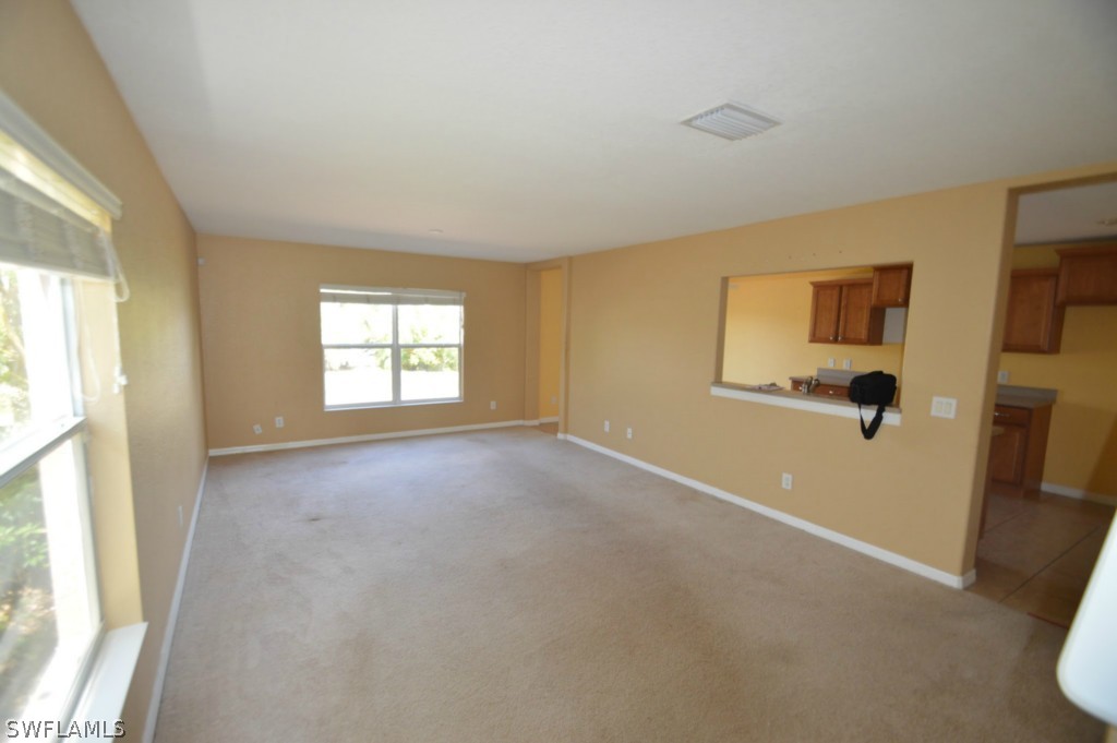 11706 Tempest Harbor Loop Venice, FL 34292 - Photo 5 of 20 a view of a big room with windows and closet