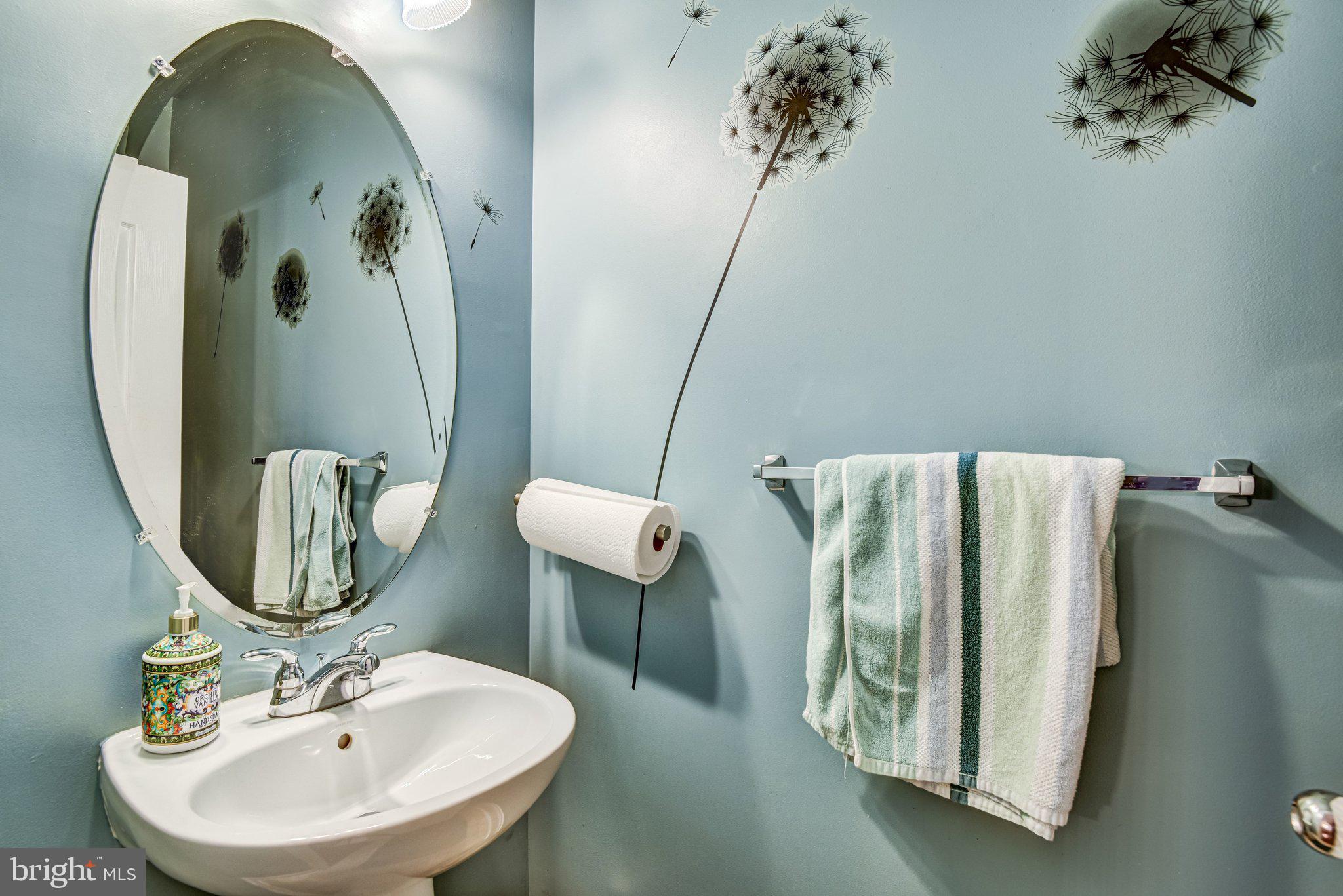 4112 Potomac Highlands Circle Triangle, VA 22172 - Photo 13 of 41 a bathroom with a sink and mirror