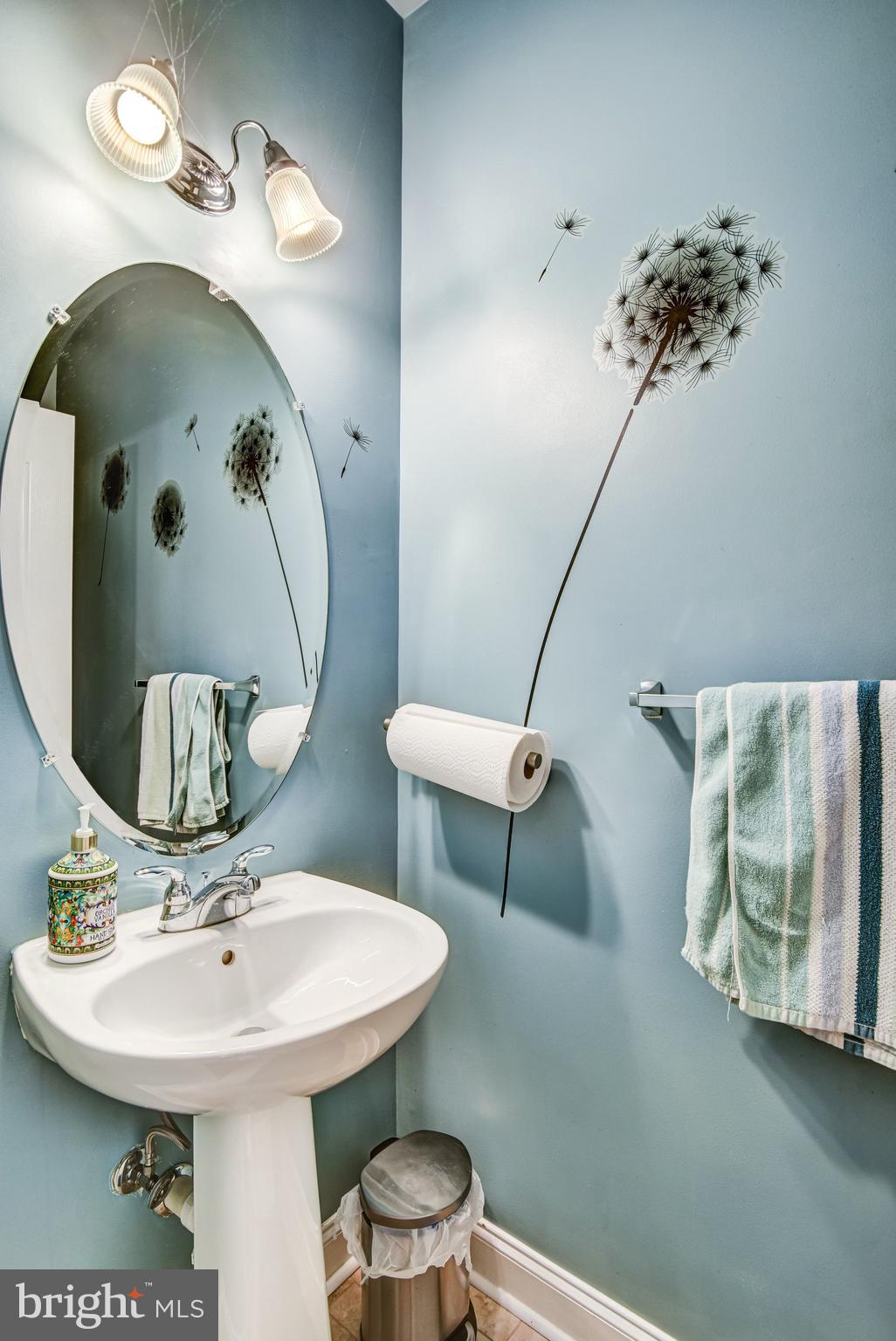 4112 Potomac Highlands Circle Triangle, VA 22172 - Photo 14 of 41 a bathroom with a sink and a mirror