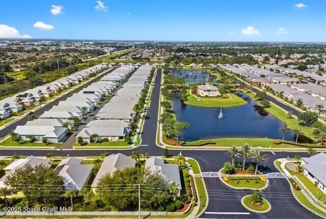 4150 Alamanda Key Drive Melbourne, FL 32901 - Photo 35 of 65 an aerial view of a city with lawn chairs