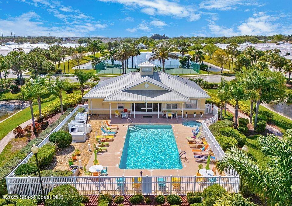 4150 Alamanda Key Drive Melbourne, FL 32901 - Photo 38 of 65 an aerial view of residential houses with outdoor space and swimming pool