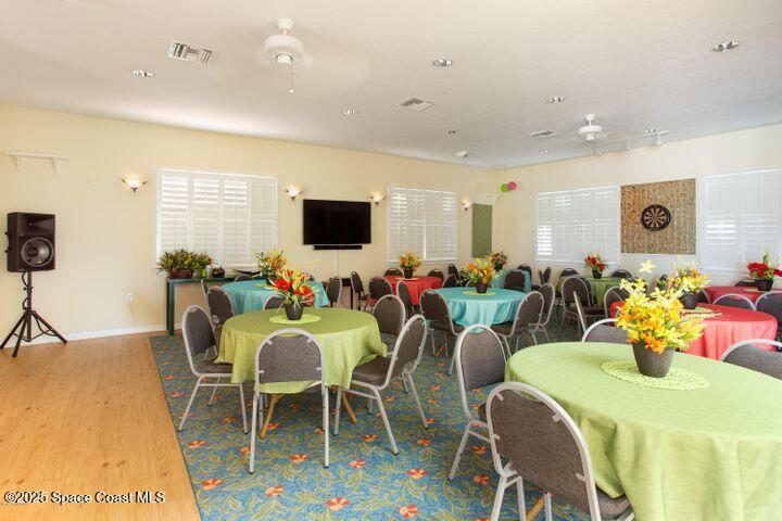 4150 Alamanda Key Drive Melbourne, FL 32901 - Photo 47 of 65 a view of a dining room with furniture