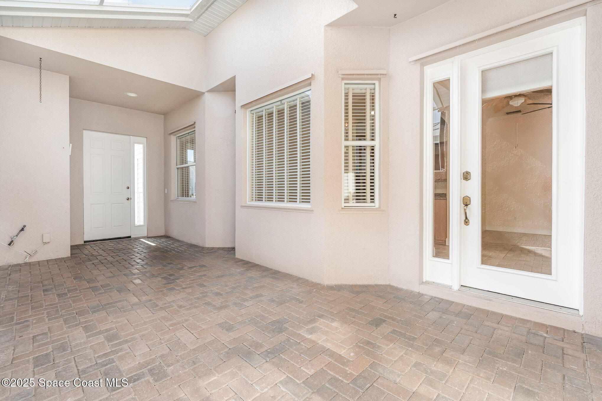 4150 Alamanda Key Drive Melbourne, FL 32901 - Photo 6 of 65 an empty room with windows