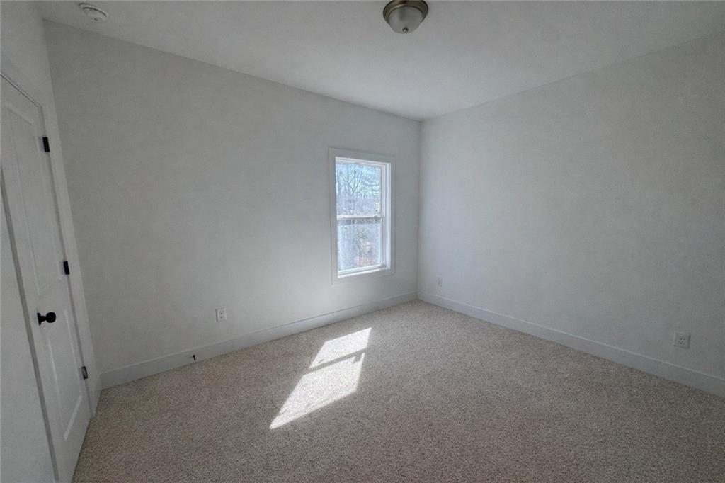 287 Bell Grove Lane Suwanee, GA 30024 - Photo 16 of 29 an empty room with a window