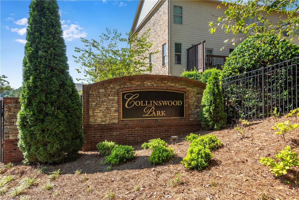 287 Bell Grove Lane Suwanee, GA 30024 - Photo 21 of 29 a sign on the side of a building