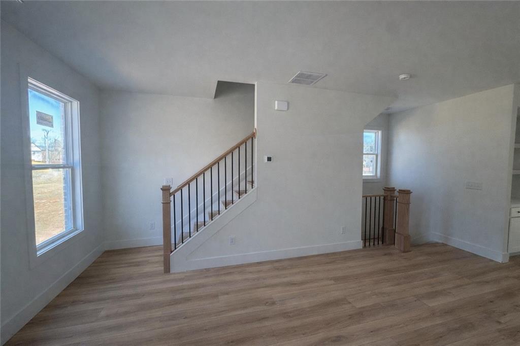 287 Bell Grove Lane Suwanee, GA 30024 - Photo 3 of 29 a view of entryway with wooden floor
