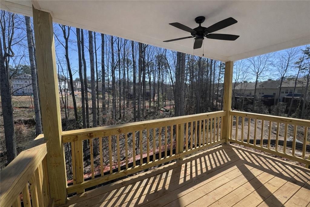 287 Bell Grove Lane Suwanee, GA 30024 - Photo 9 of 29 a view of deck with a flat screen tv and a swing