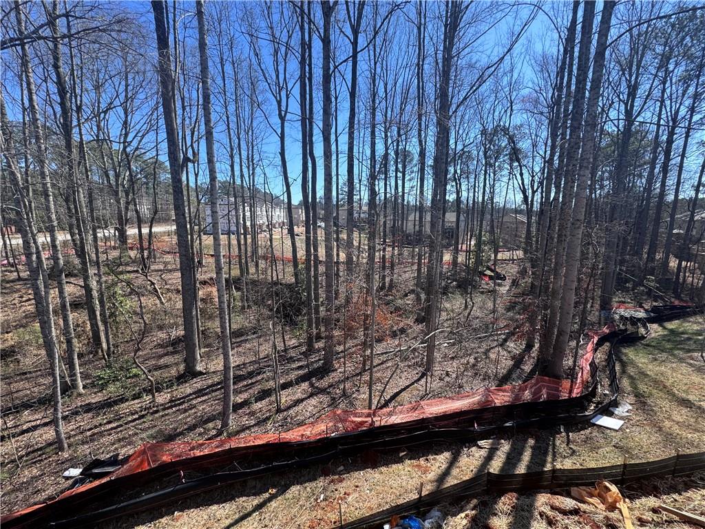 287 Bell Grove Lane Suwanee, GA 30024 - Photo 10 of 29 a view of a backyard from a balcony