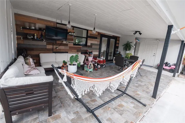 a view of a dining room with furniture