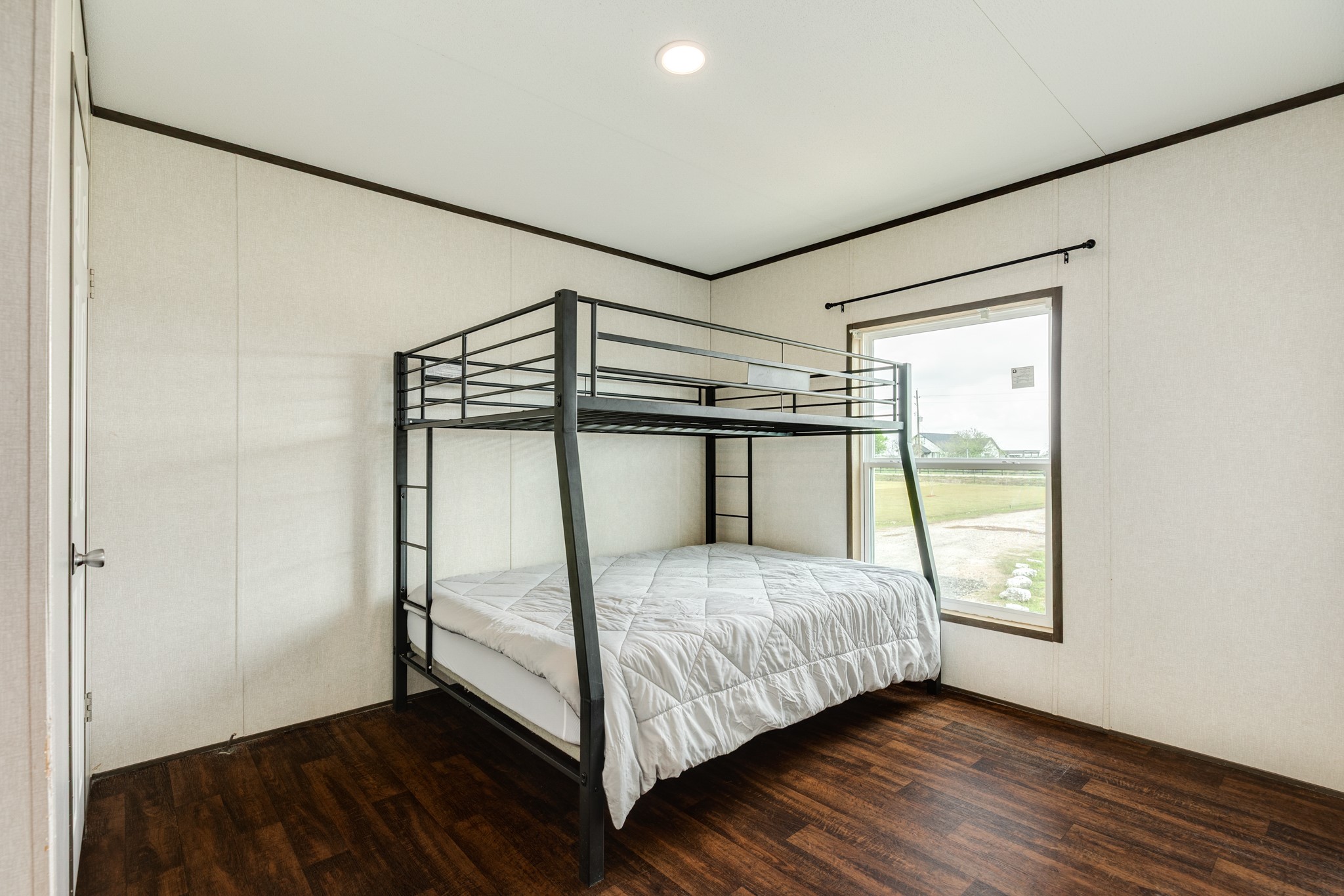 1886 County Road 212 Angleton, TX 77515 - Photo 23 of 36 a bedroom with a bed and a window