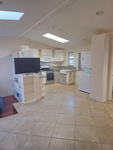 a kitchen with a cabinets and counter space