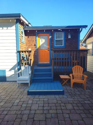 a view of a chairs and a couches in the patio