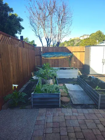 a backyard of a house with lots of green space