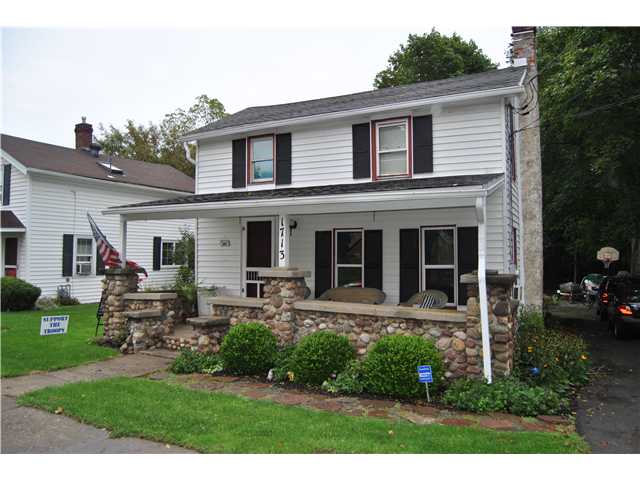 1713 Rochester Street Lima, NY 14485 - Photo 1 of 1 Exterior Front Cute and Charming stone porch