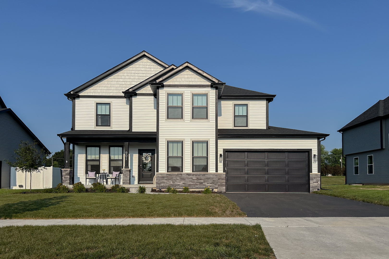 229 Zagreb Avenue Sycamore, IL 60178 - Photo 1 of 45 a front view of a house with a yard