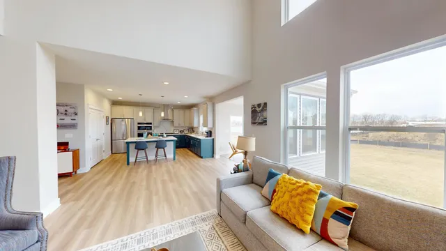 a living room with furniture and a table