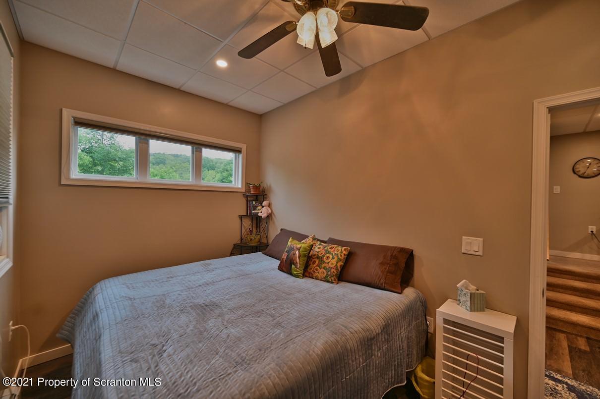 303 Main Street Nicholson, PA 18446 - Photo 18 of 98 a bedroom with a bed and window